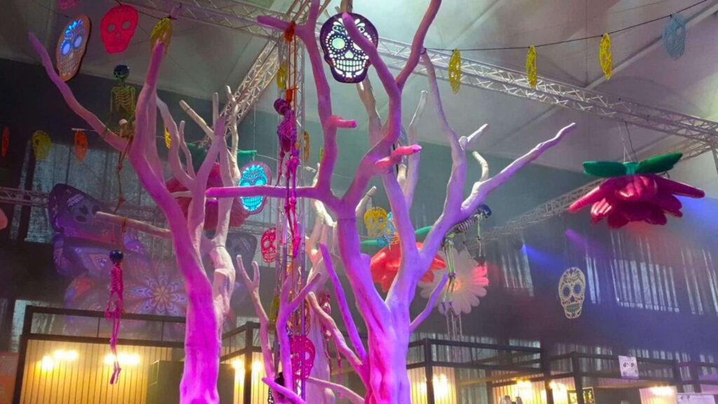 Giant tree sculpture with carnival props such as flowers and skills created for Riyadh Scare Fest.