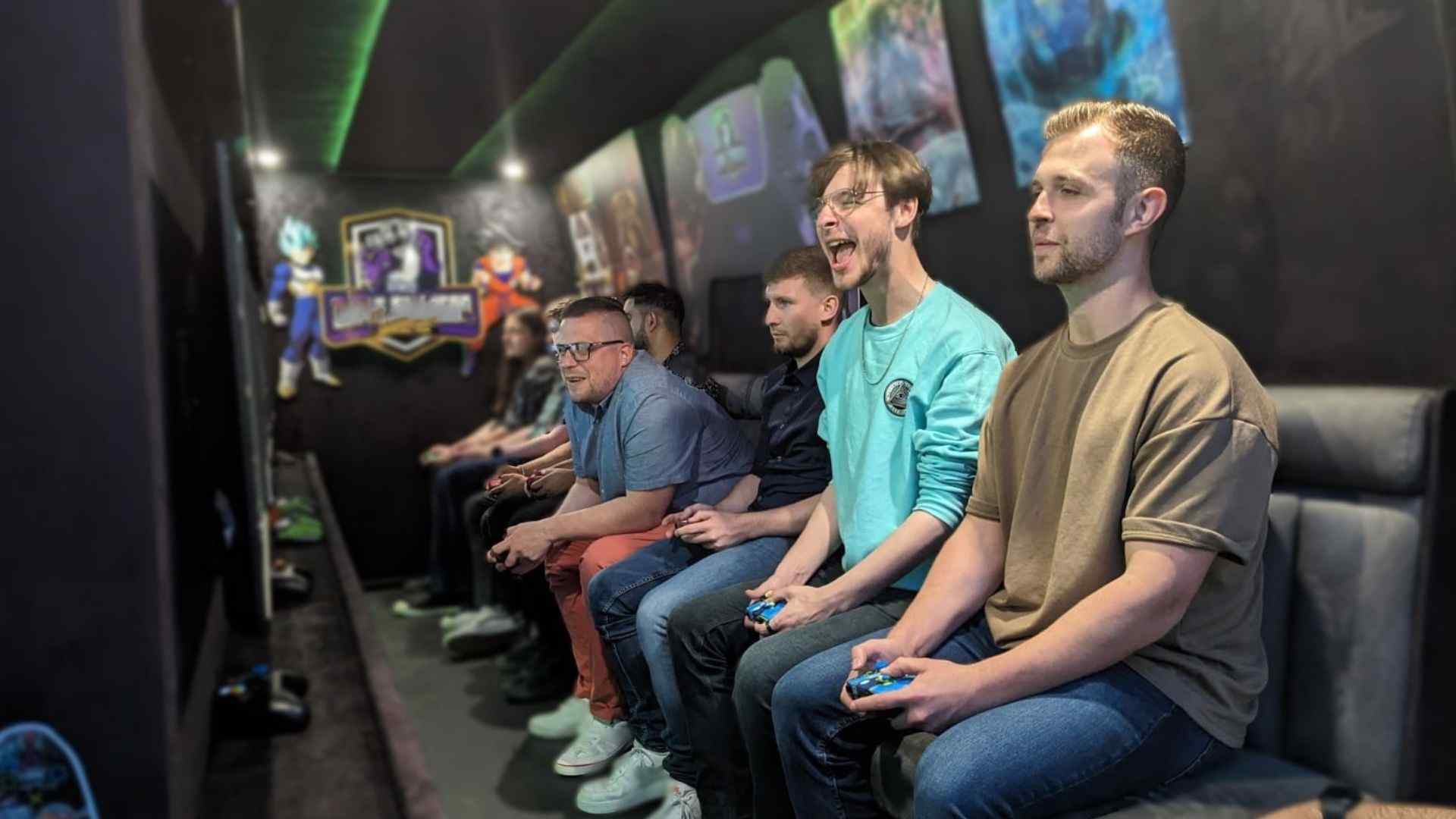 Participants playing computer games against one another in gaming van.