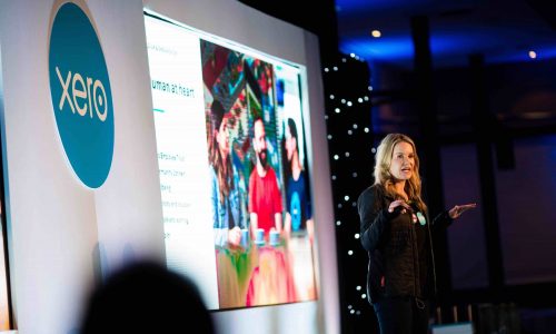 Company CEO hosting presentation at company conference, planned by our conference organisers