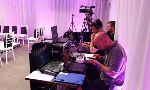 Tech team setting up for international Monarch airlines uniform fashion show launch. We provided full event management and production services